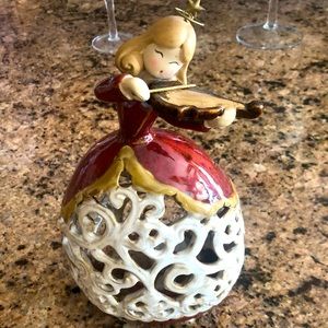 Figurine candle holder